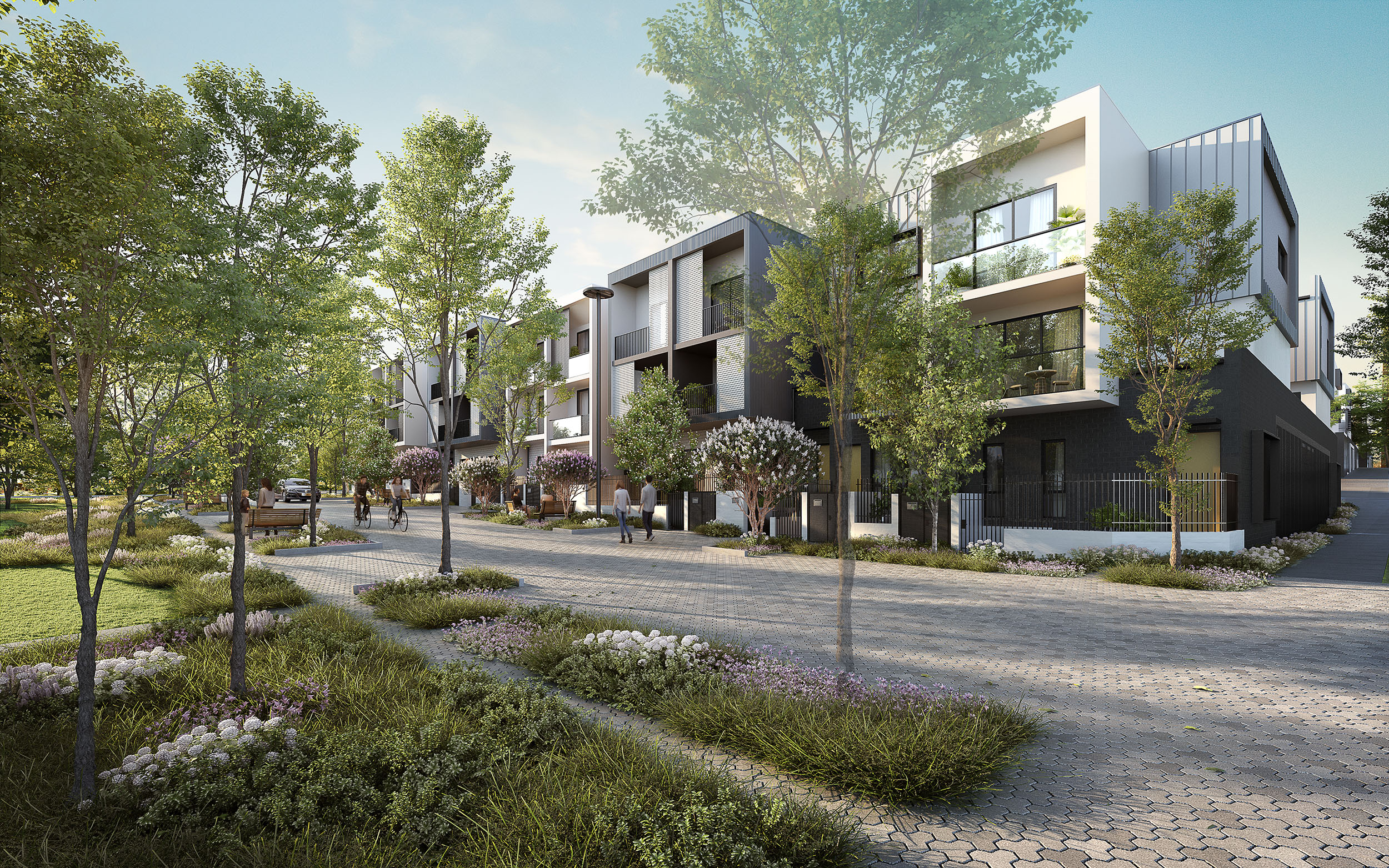 Contemporary townhouse development with tree-lined streets, landscaped public realm, and modern urban living residences