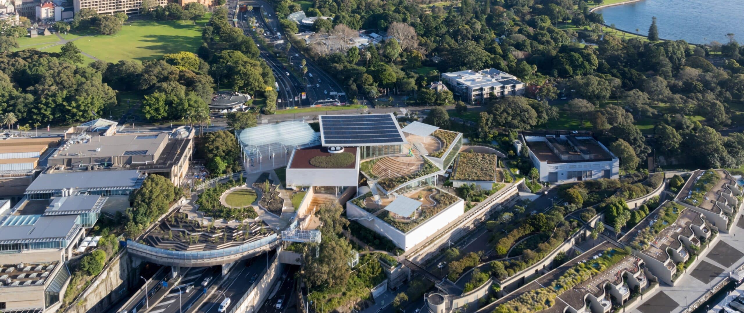 Aerial view of Naala Badu: the Art Gallery of New South Wales surrounded by trees, near Sydney Harbour