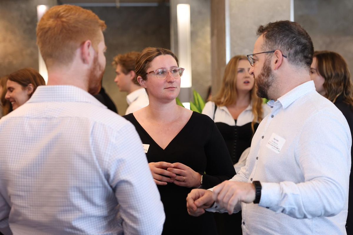 Delegates networking with exhibitors at Green Building Forum 2025